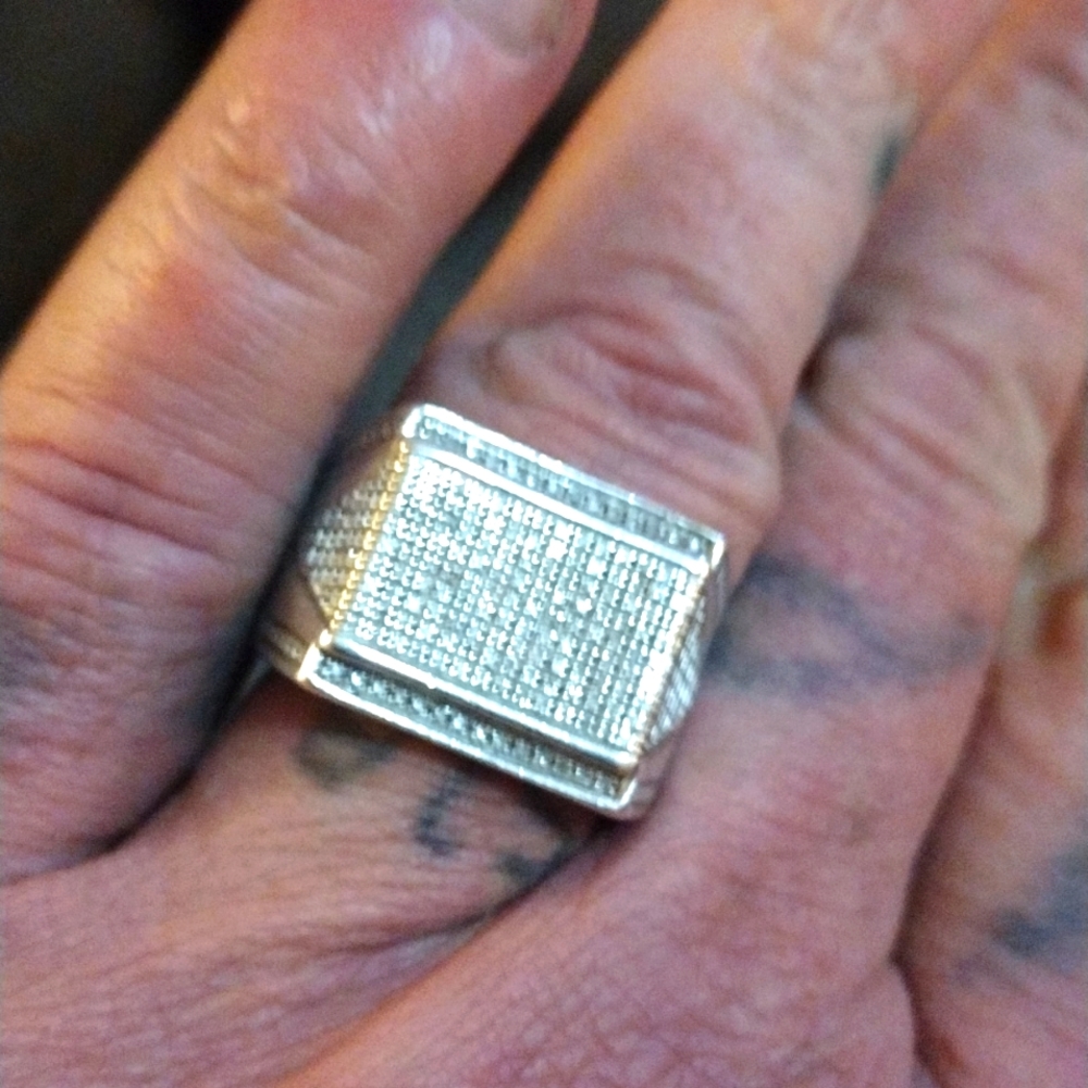 Sliver ring with diamonds
